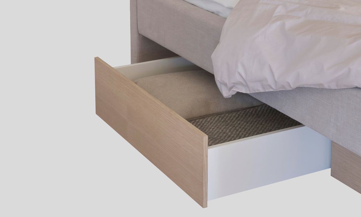 Lyra waterbed, close-up of the open storage drawer