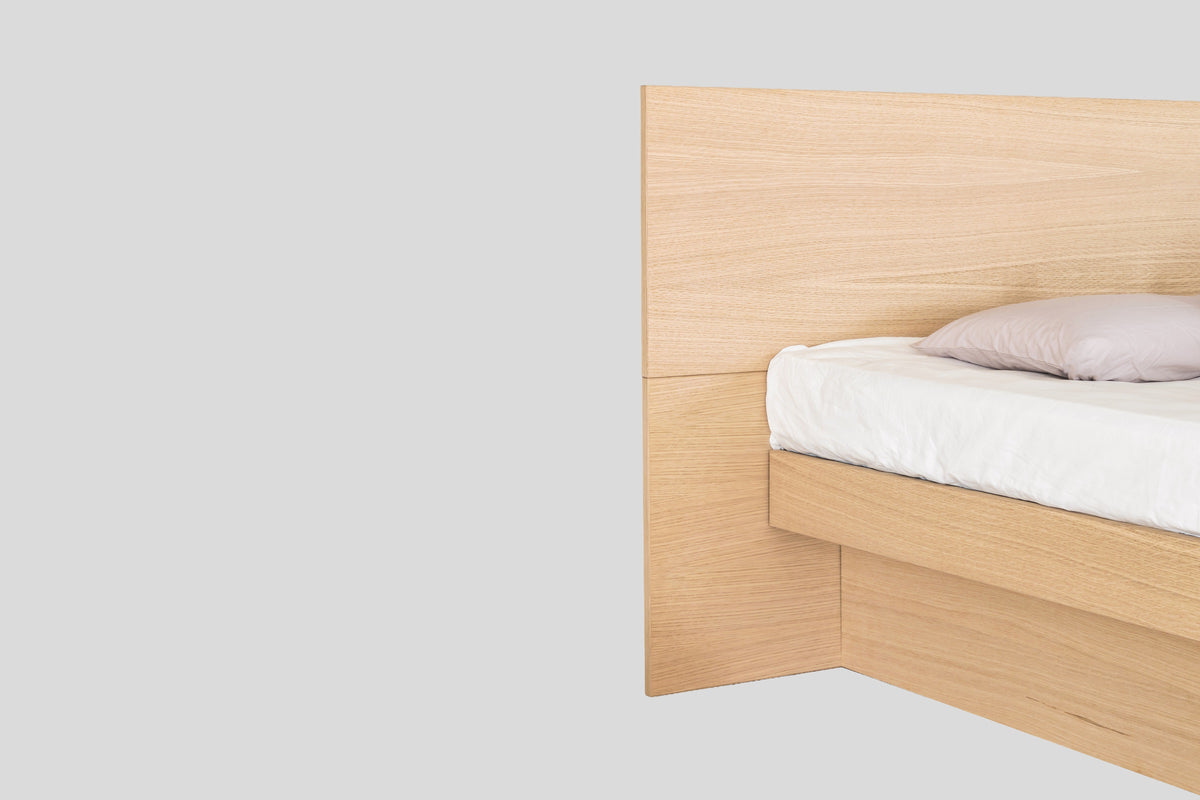 Nordic waterbed, close-up of the wooden headboard and frame